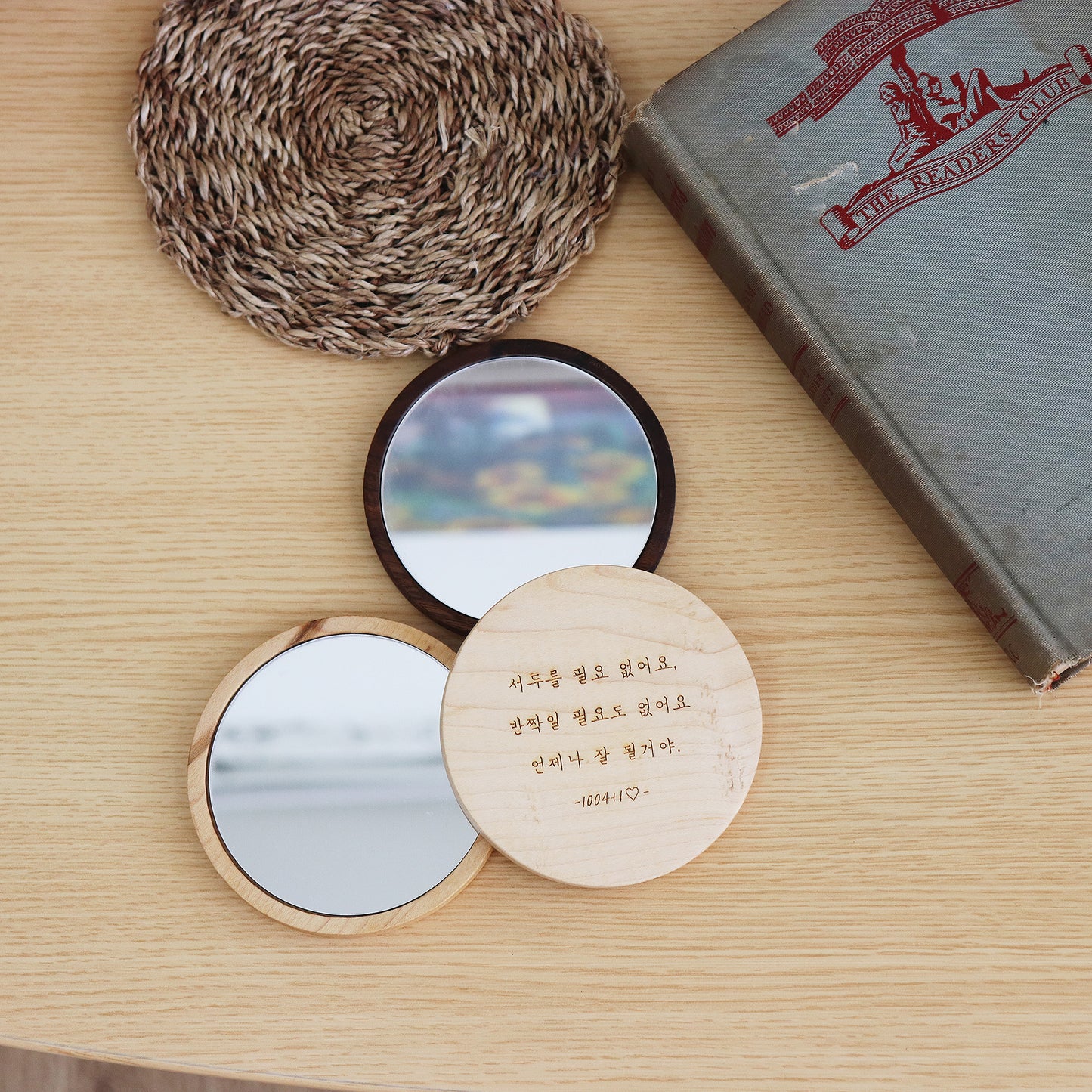 Atelier Hangeul handmade wooden hand mirror with Korean text and drawing